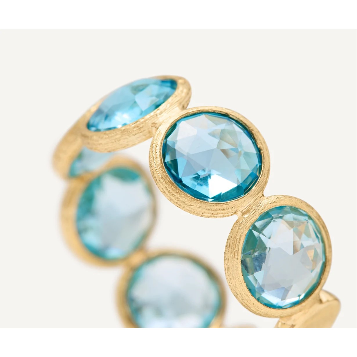 Bandring aus Gelbgold mit Topasen
